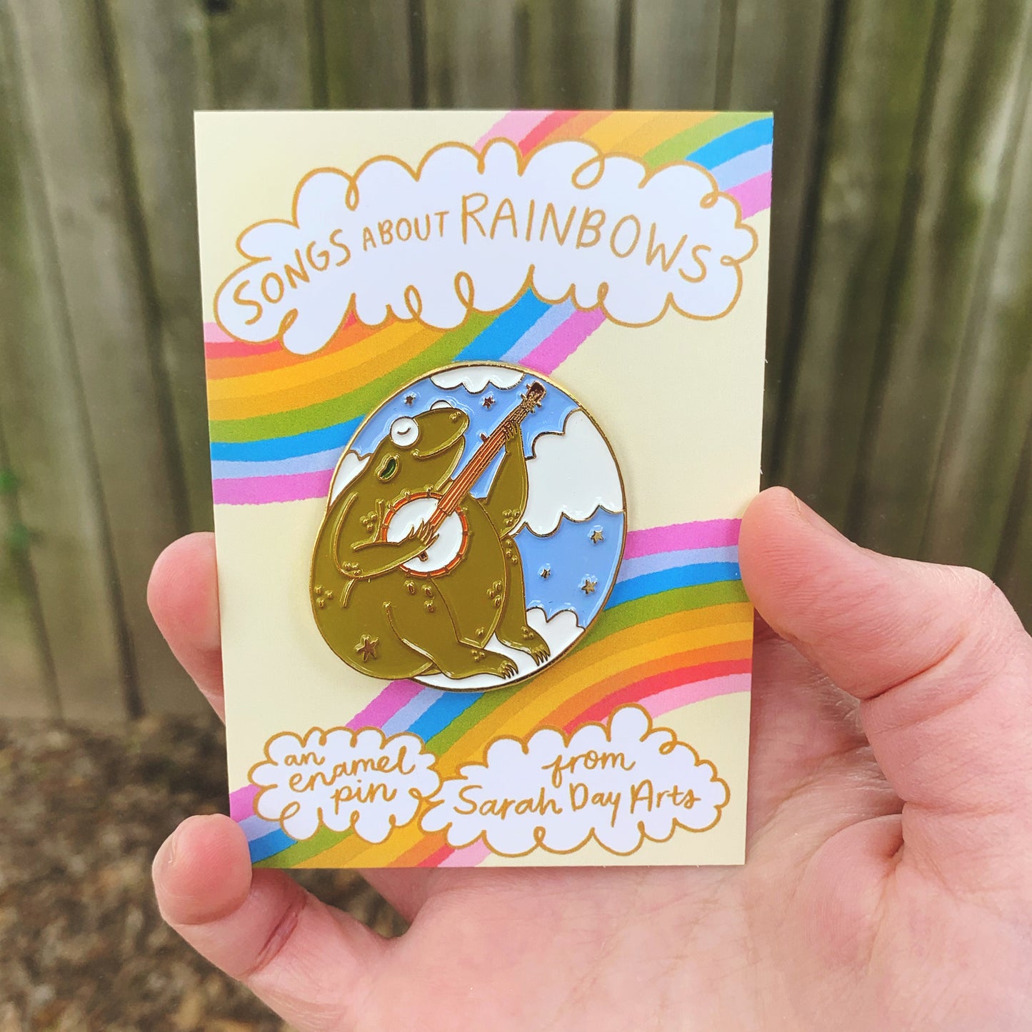 Songs About Rainbows enamel pin